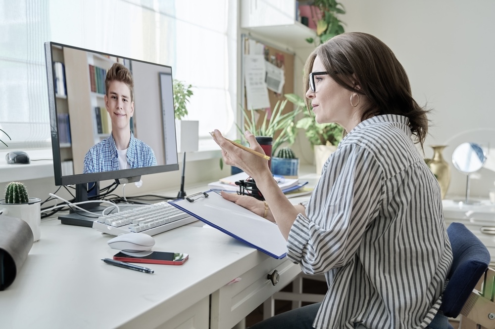 Young female consulting with a virtual counselor for mental health